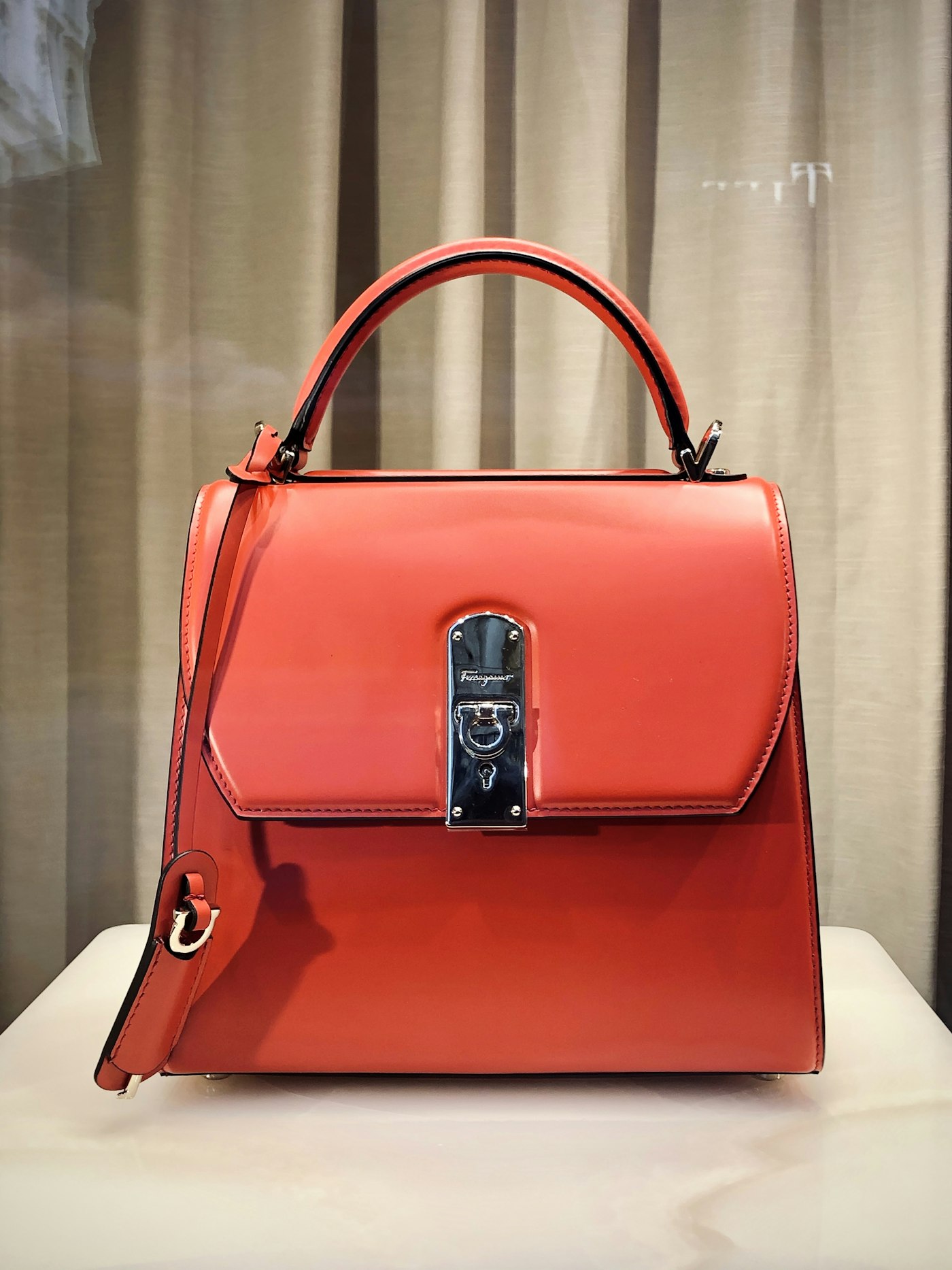 Coral structured leather handbag