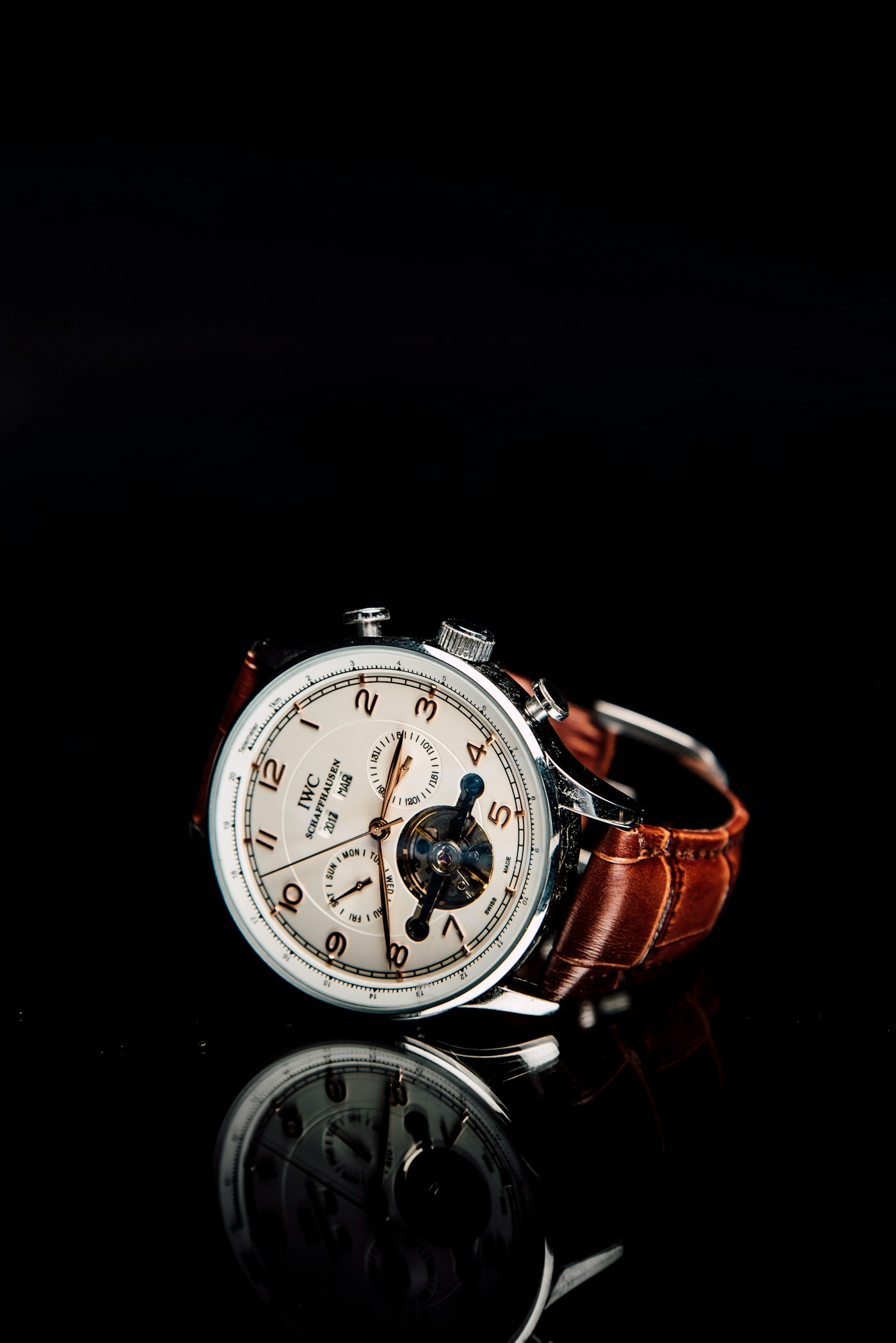 IWC watch with a cream dial
